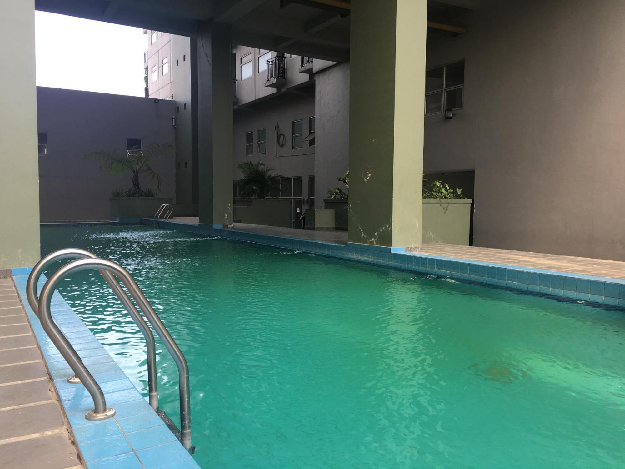 Apartemen Cozy Furnished 2br At Grand Afrika By Travelio *